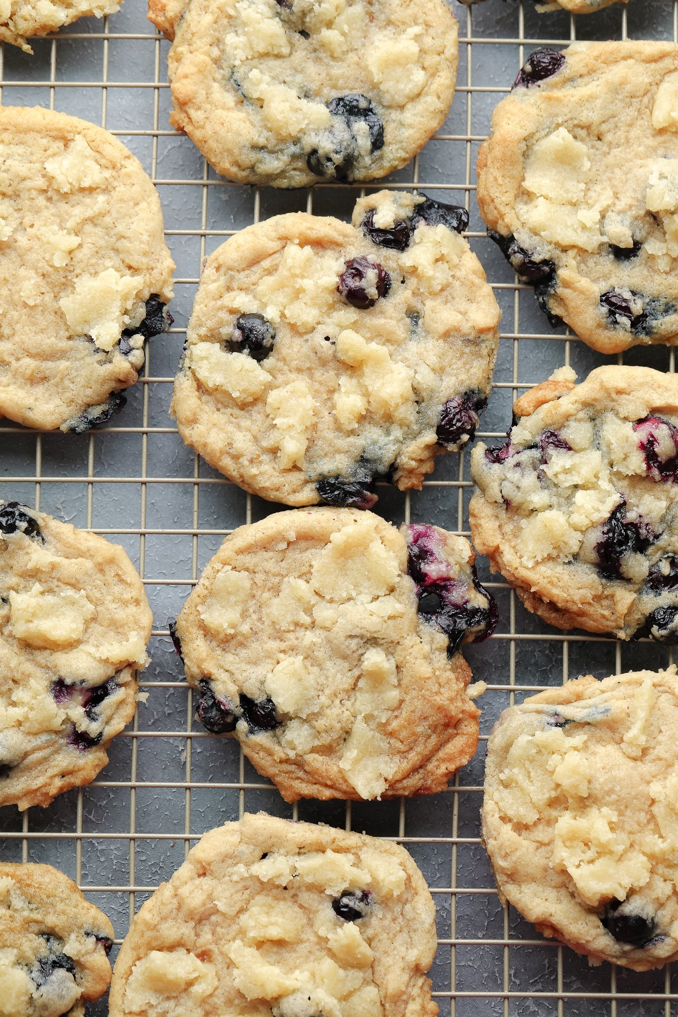 vegan blueberry cookies on a wire rack.