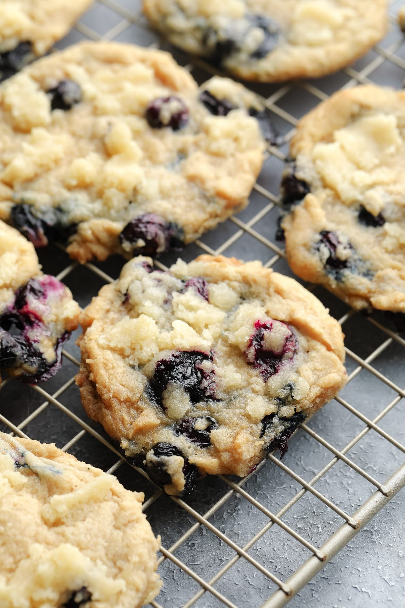 vegan blueberry cookies on a wire rack.