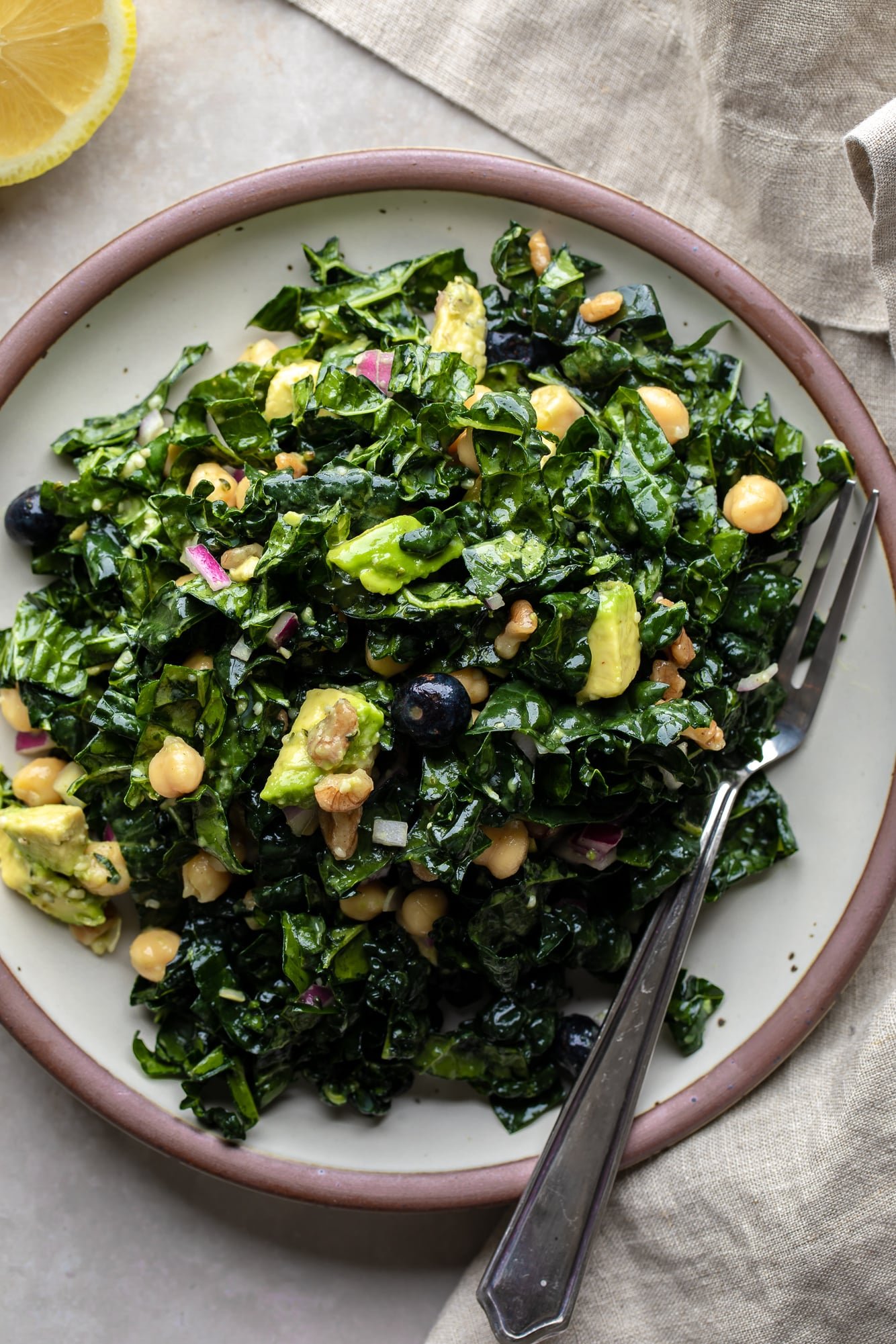 a kale salad on a plate.
