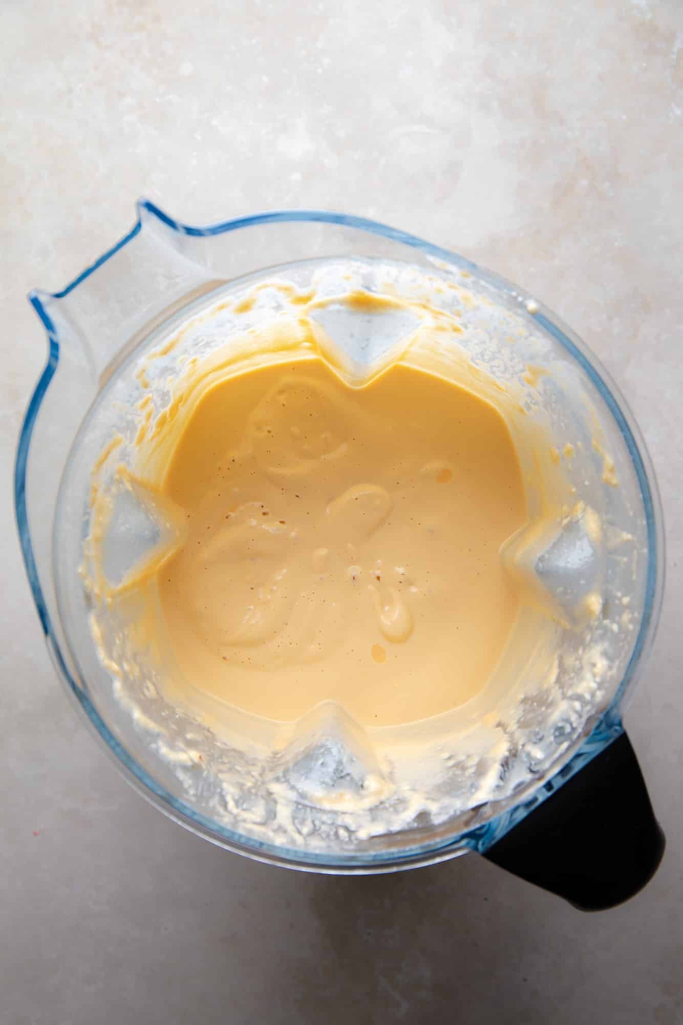 the creamy cashew sauce for vegan Mexican street corn in a blender.