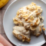 vegan banana pudding on a plate with a spoon