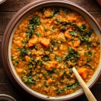 overhead view of a bowl of Sweet Potato Red Lentil Stew.