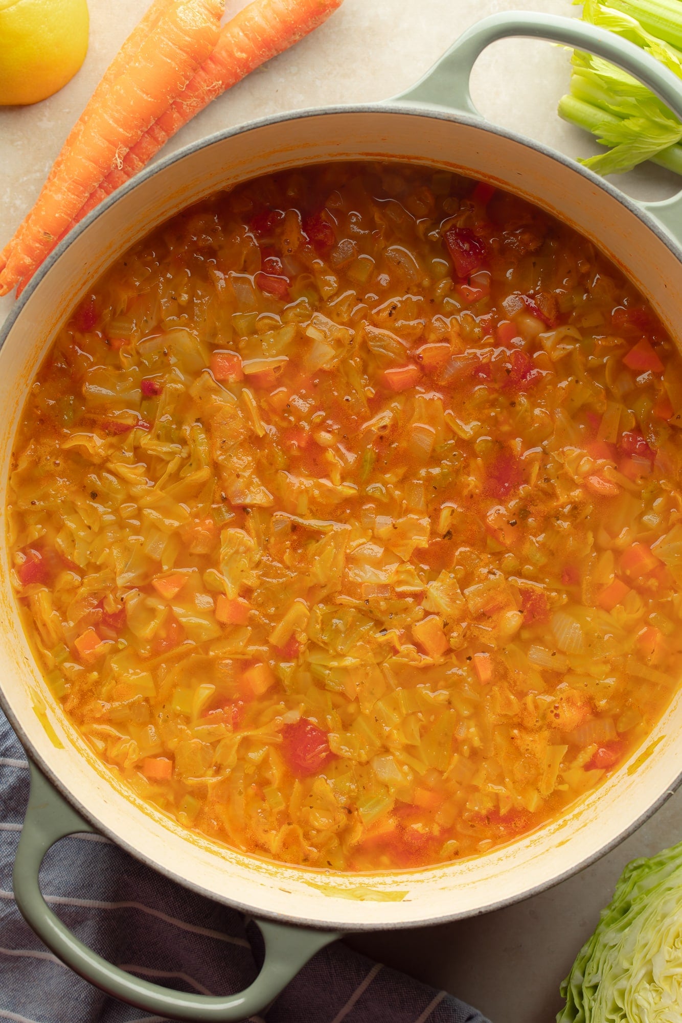 overhead view of a pot of vegan cabbage soup.