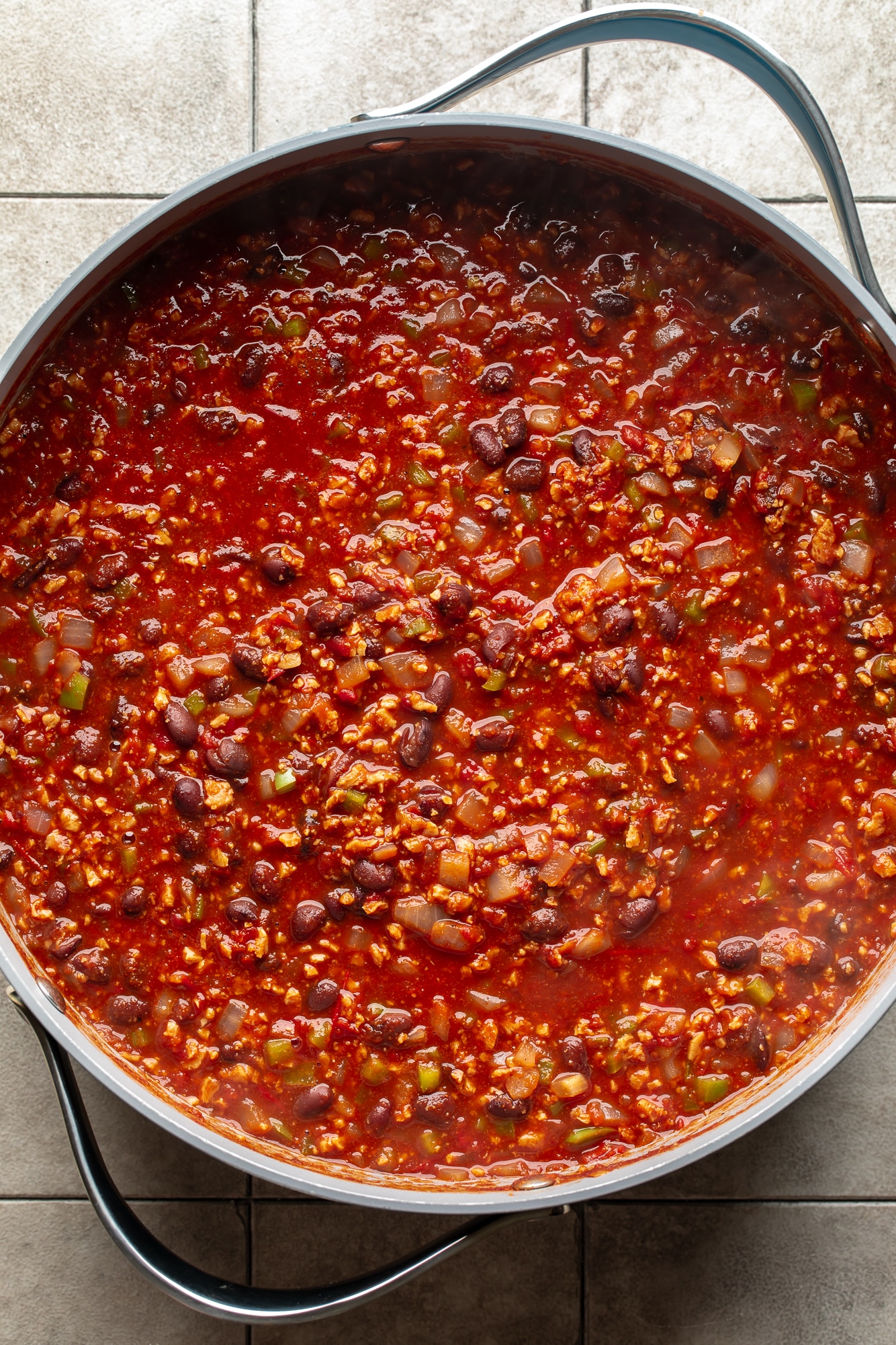 overhead view of a pot filled with vegan chili.