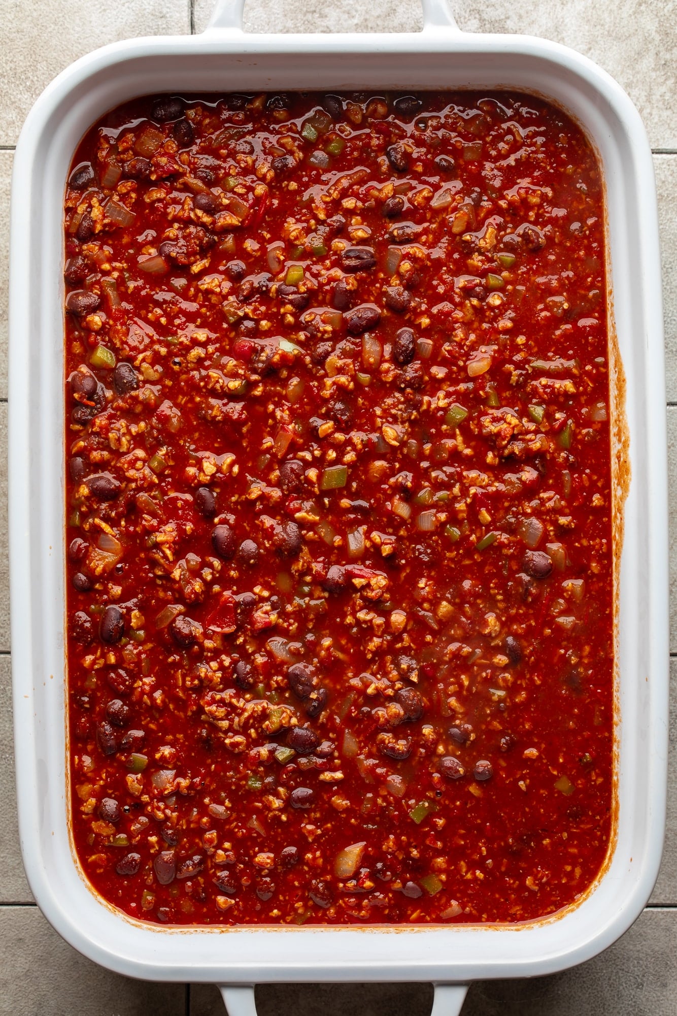 overhead view of vegan chili in a large casserole dish.