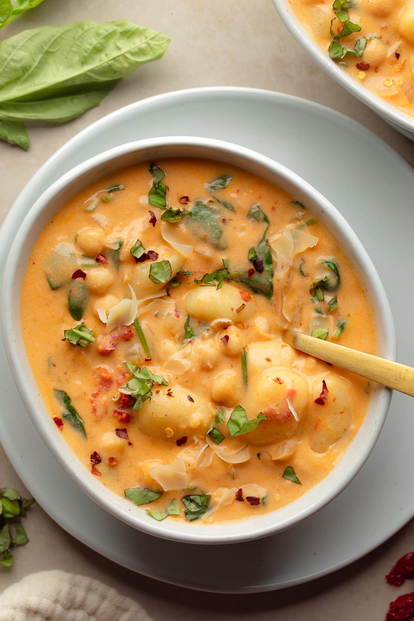 overhead view of vegan marry me gnocchi soup in a bowl.