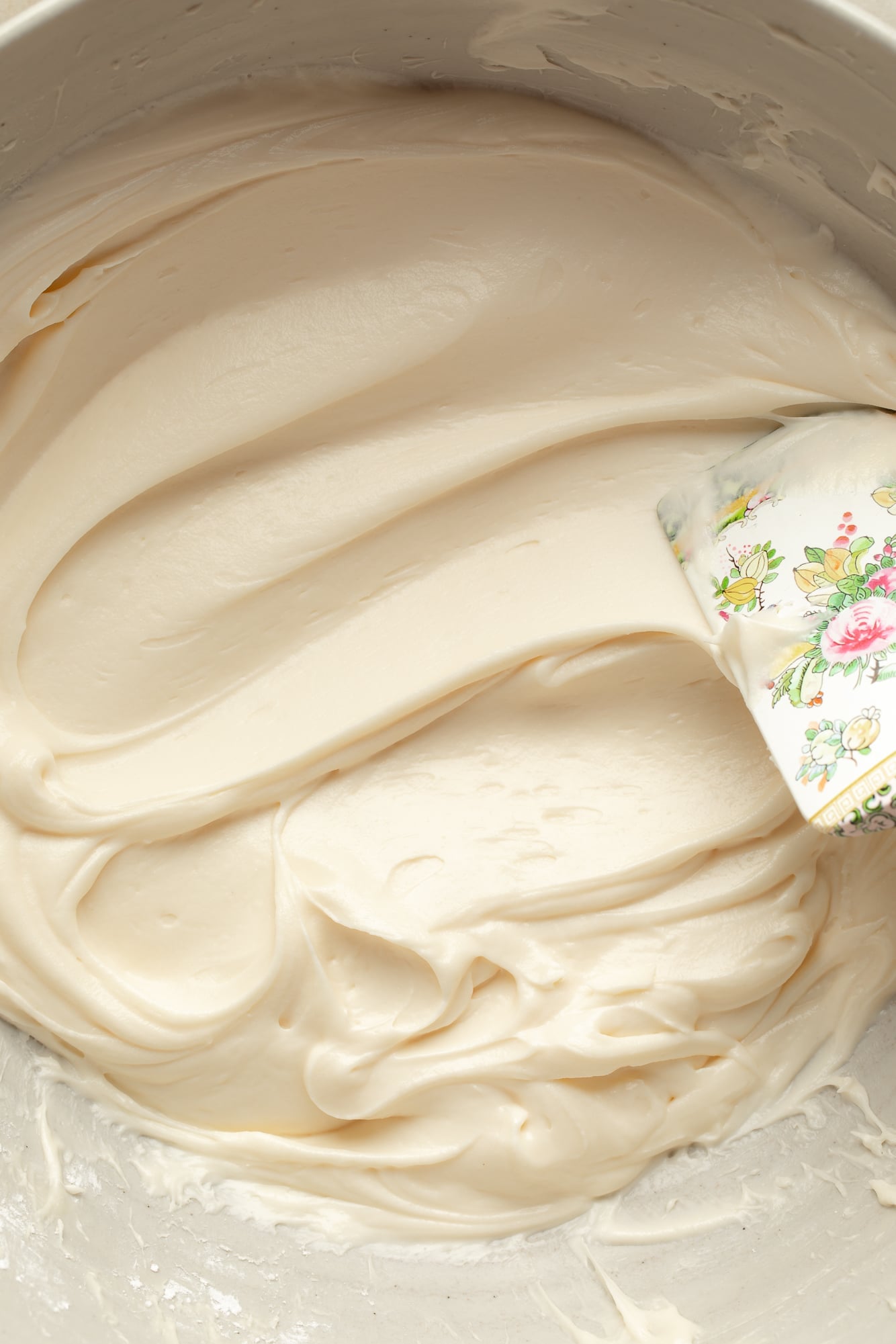 Overhead view of Vegan Cream Cheese Frosting in a bowl.