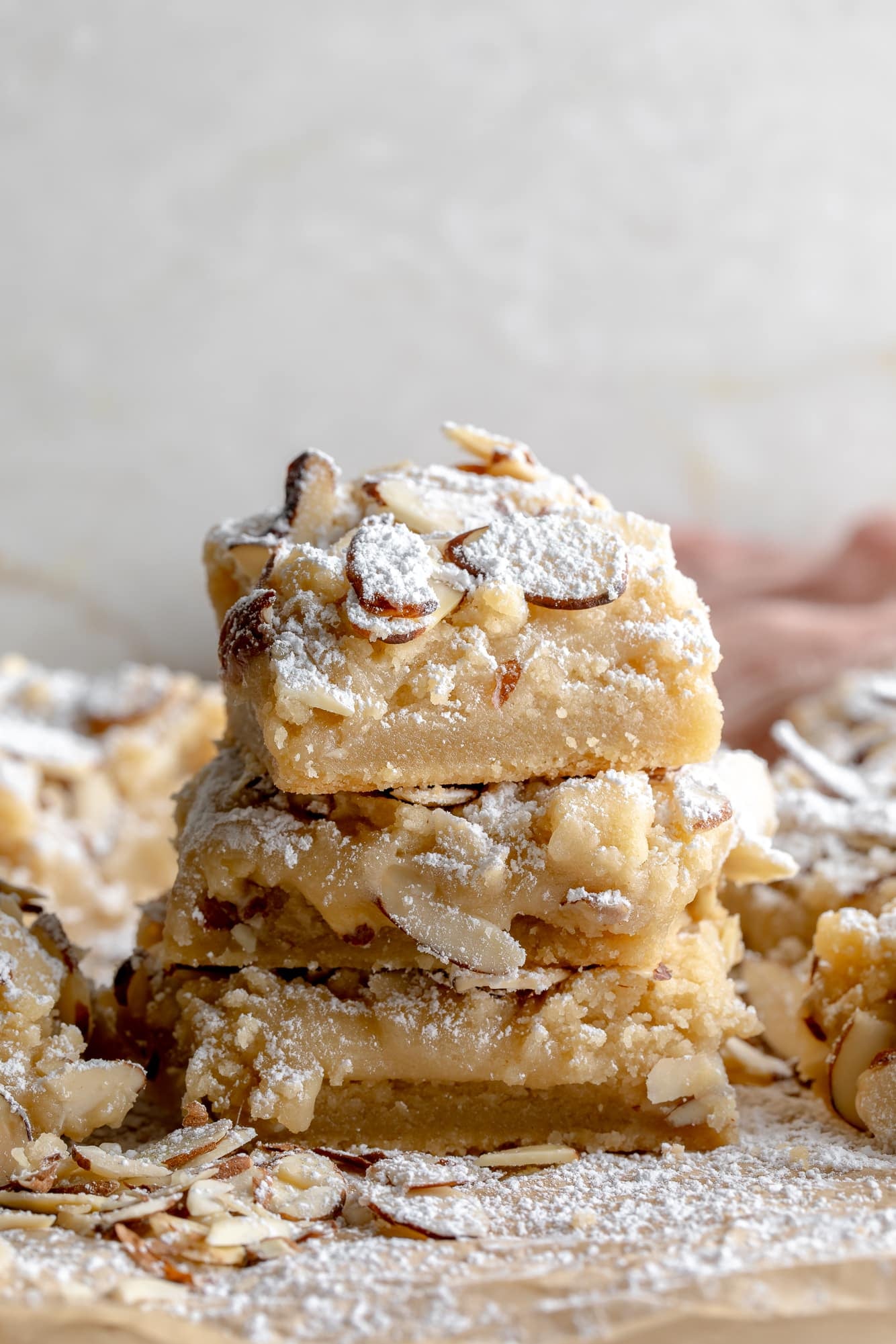 side view of a stack of 3 vegan almond croissant bars.