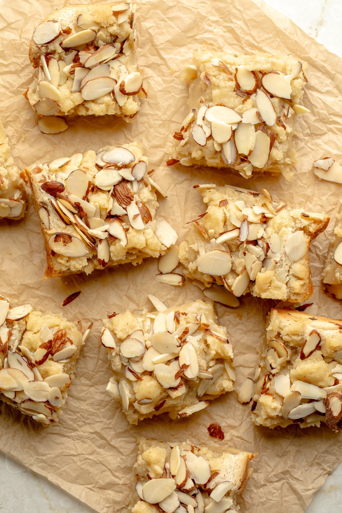 overhead view of vegan almond croissant bars on a piece of parchment.