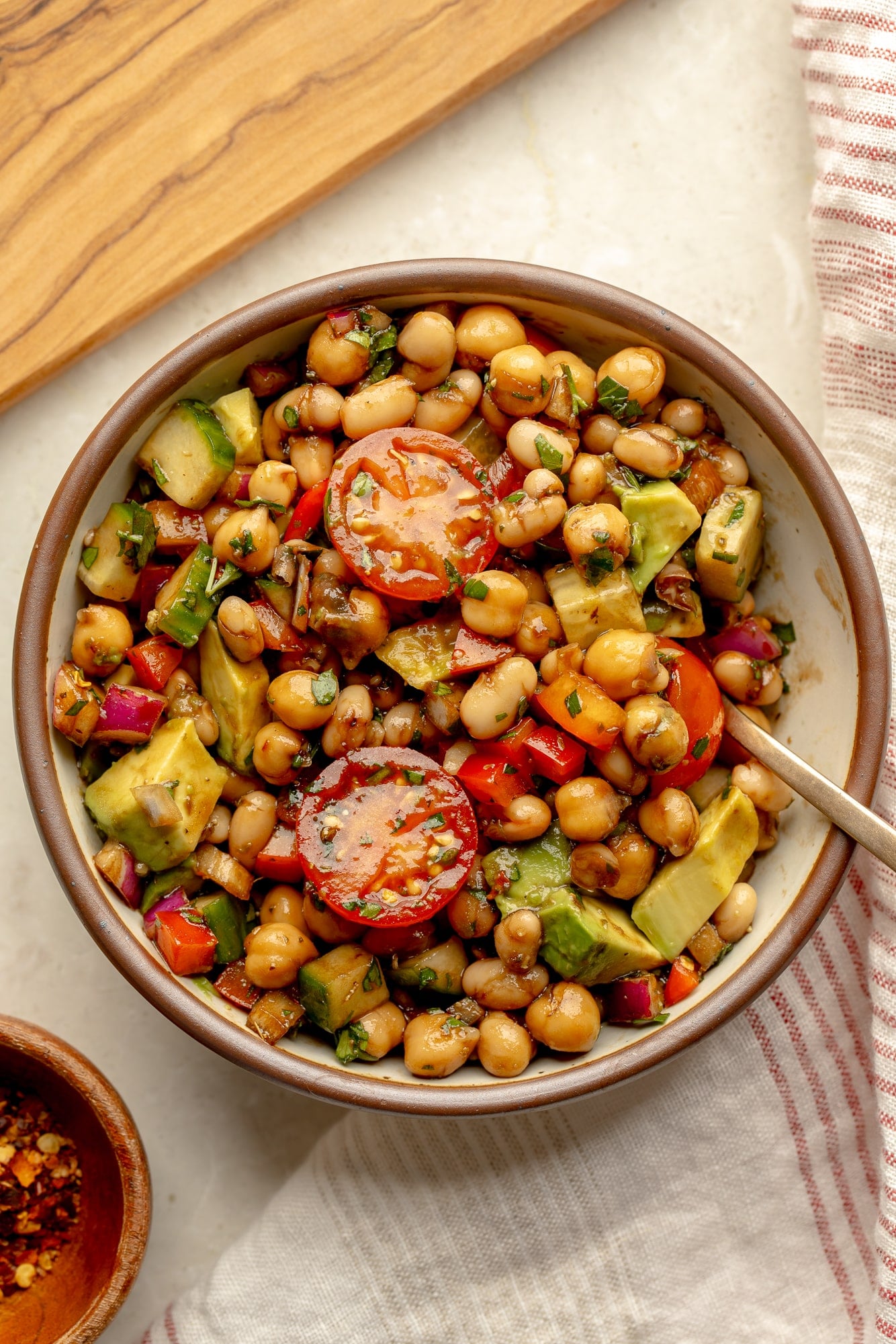 overhead view of a dense bean salad in a bowl.