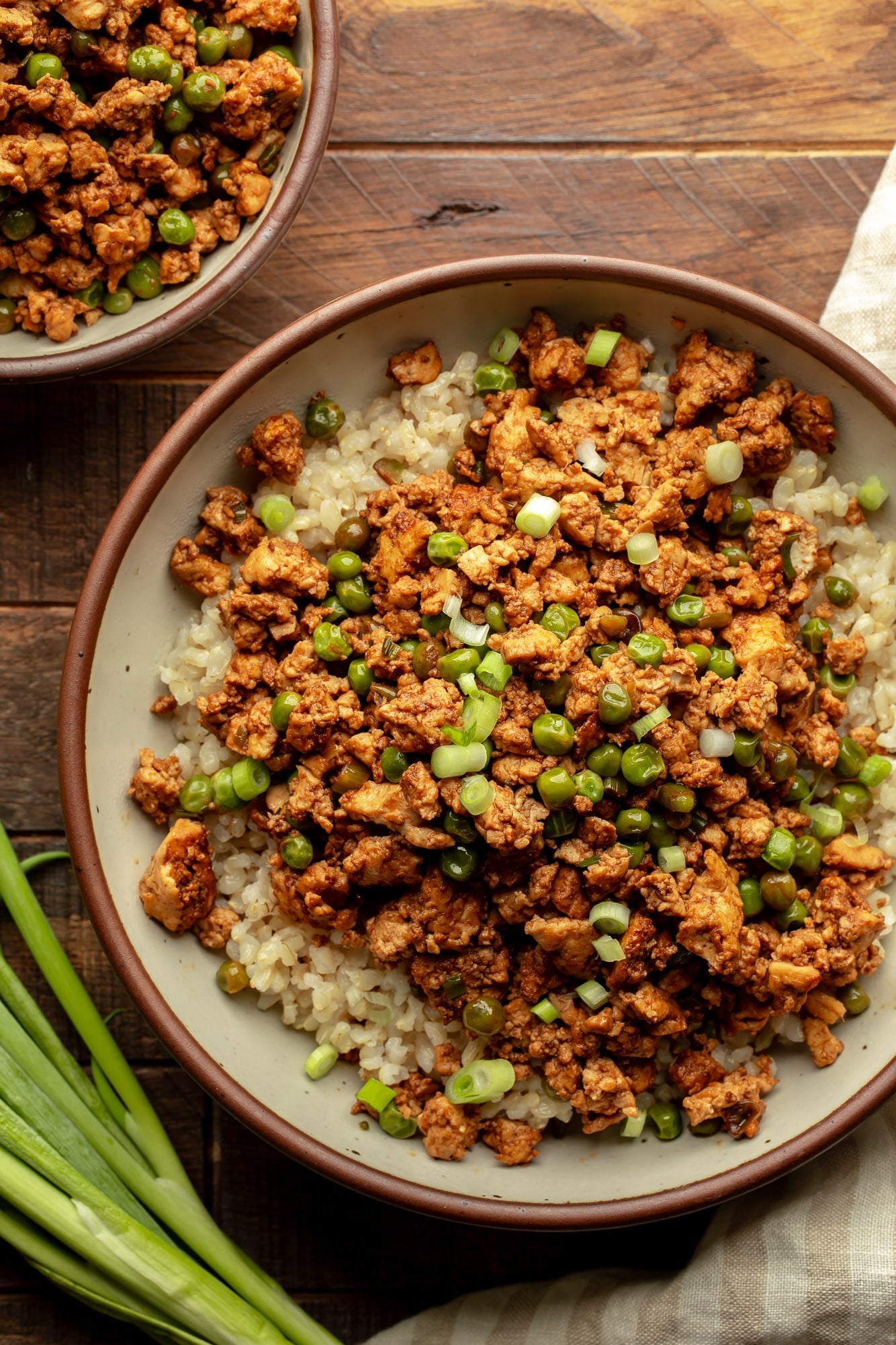 overhead view of a spicy ginger ground tofu rice bowl.