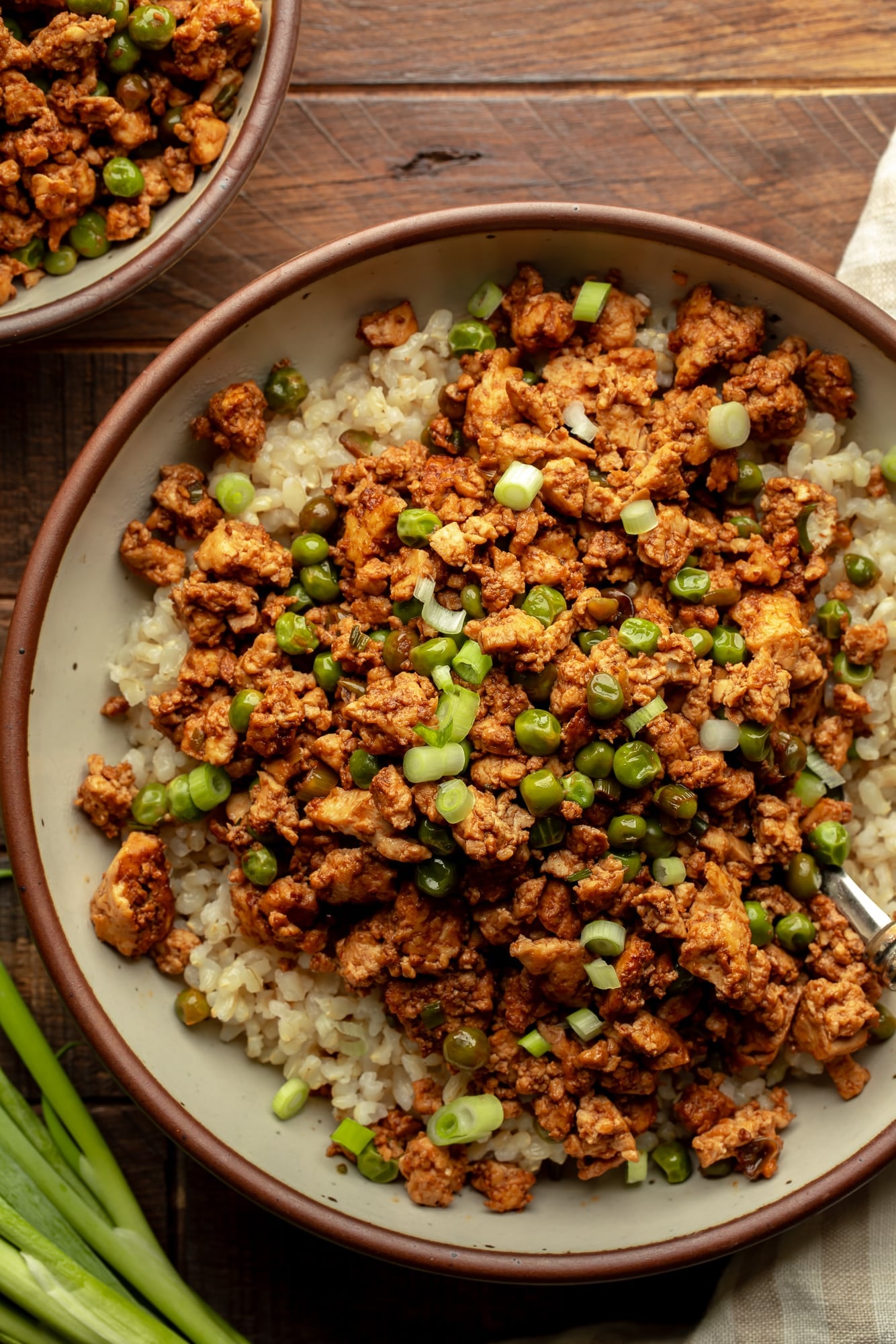 overhead view of a spicy ginger ground tofu rice bowl.